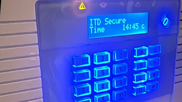 Alarm keypad showing a fault warning light – ITD Secure, Kent